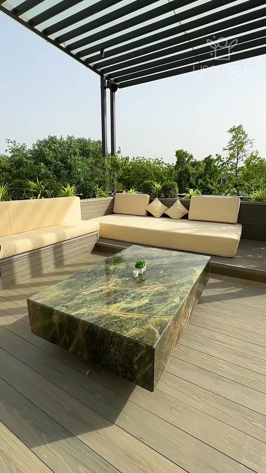 Film of a terrace with louvred pergola and deck
